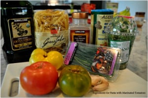 Ingredients for pasta and marinated tomatoes