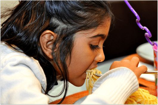 Pretty Girl Eating Spaghetti