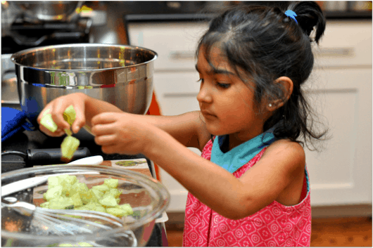 Helping with Cucumbers