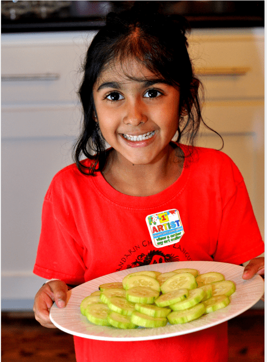 Helping with Cucumbers