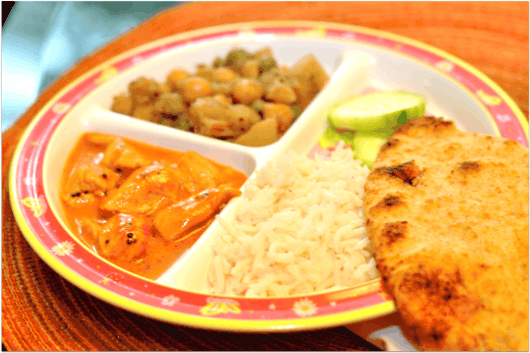 Indian Kids Meal with rice naan potatoes and tikka masala