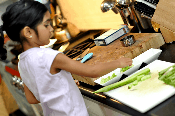 Annisa helping with dinner