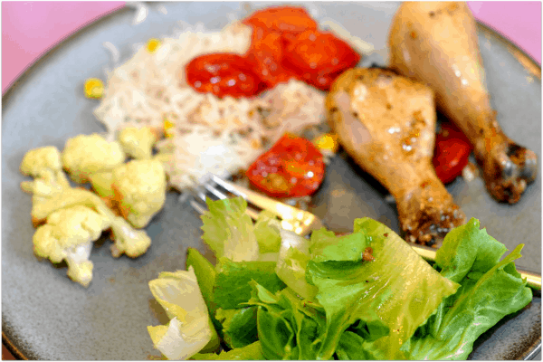 Roasted Chicken with Tomatoes and roasted cauliflower sald and rice