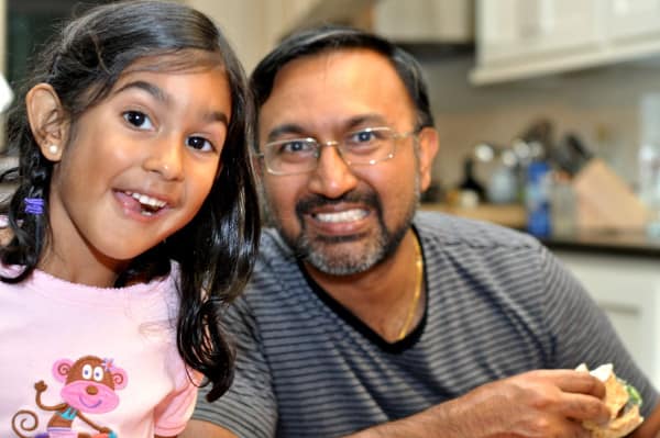 Dad and Daughter Enjoying Dinner