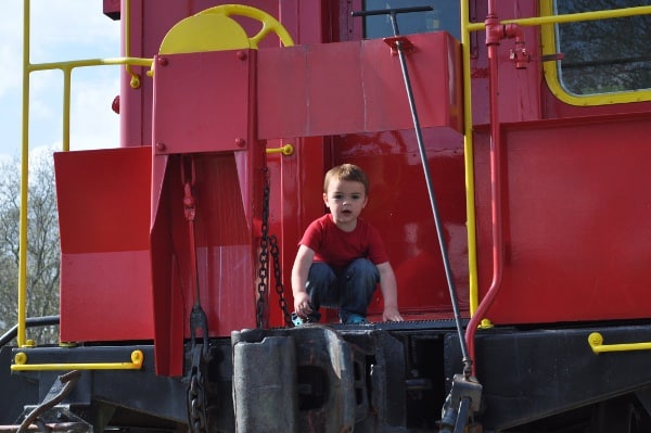 Playing on Caboose at Tomball Train Depot