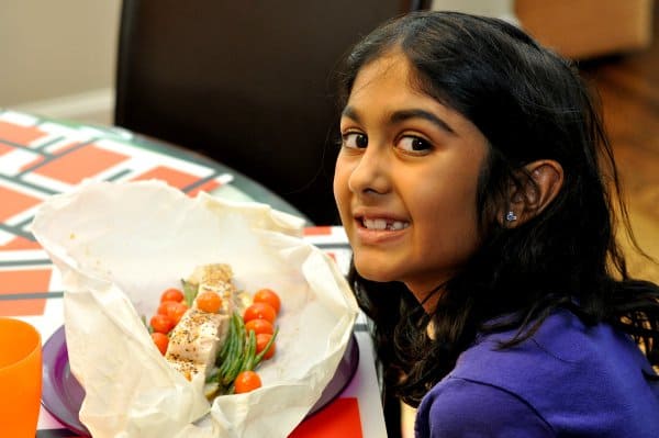 Enjoying Dinner of Fish and Veggies in Parchment Paper