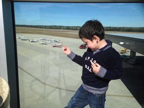 Looking at Airplanes at Black Walnut at Conroe Airport