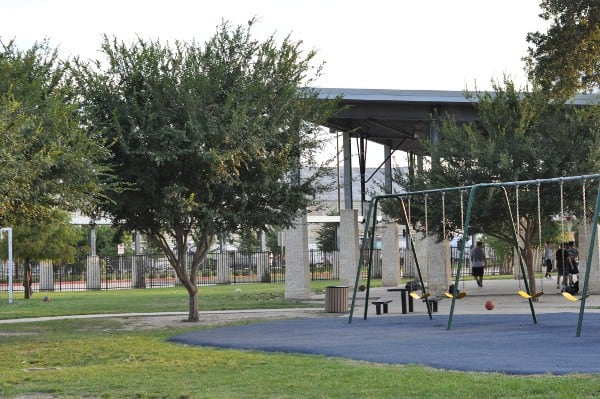 Shadow Oaks Spark Park Swings and Basketball Court