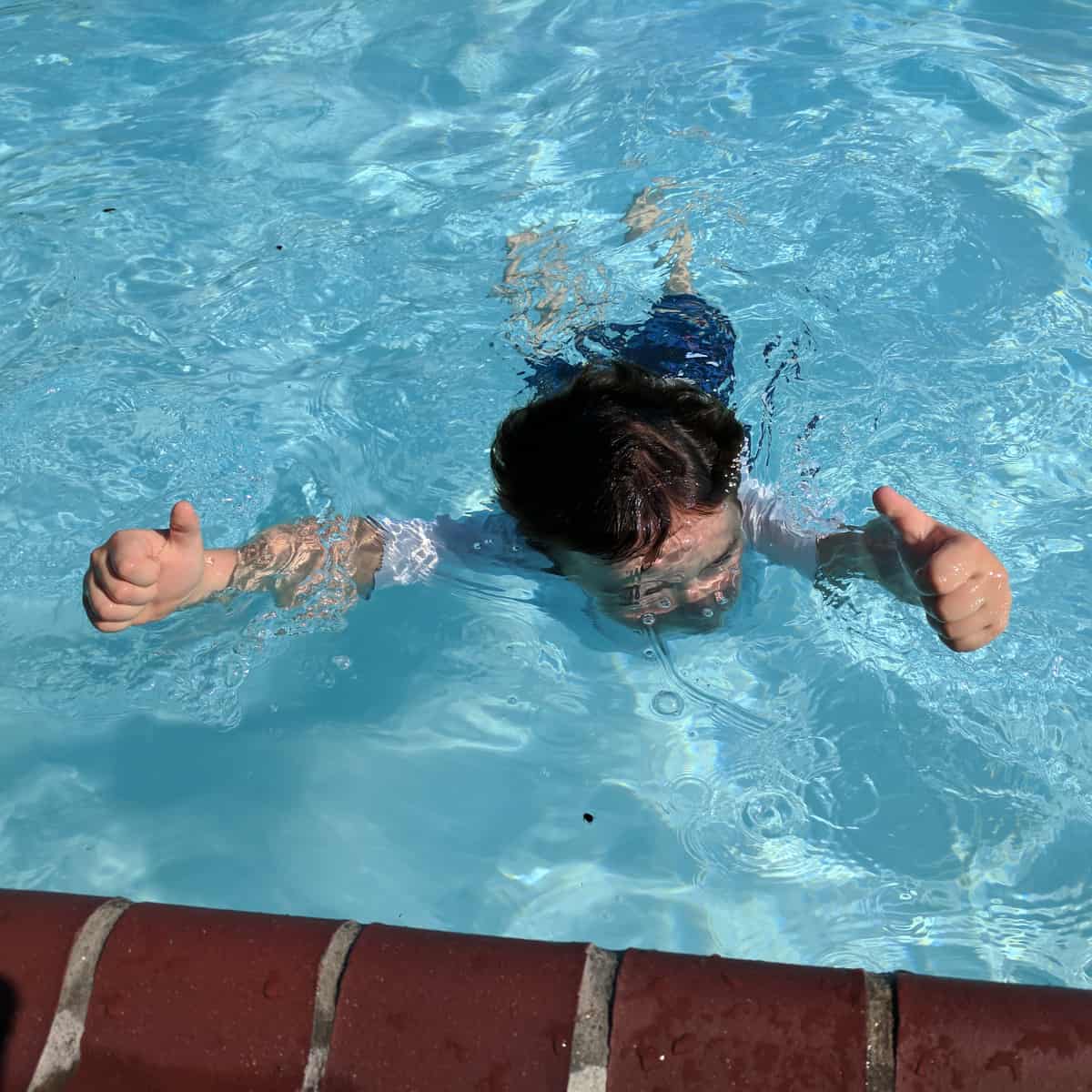 Thumbs Up in the Pool