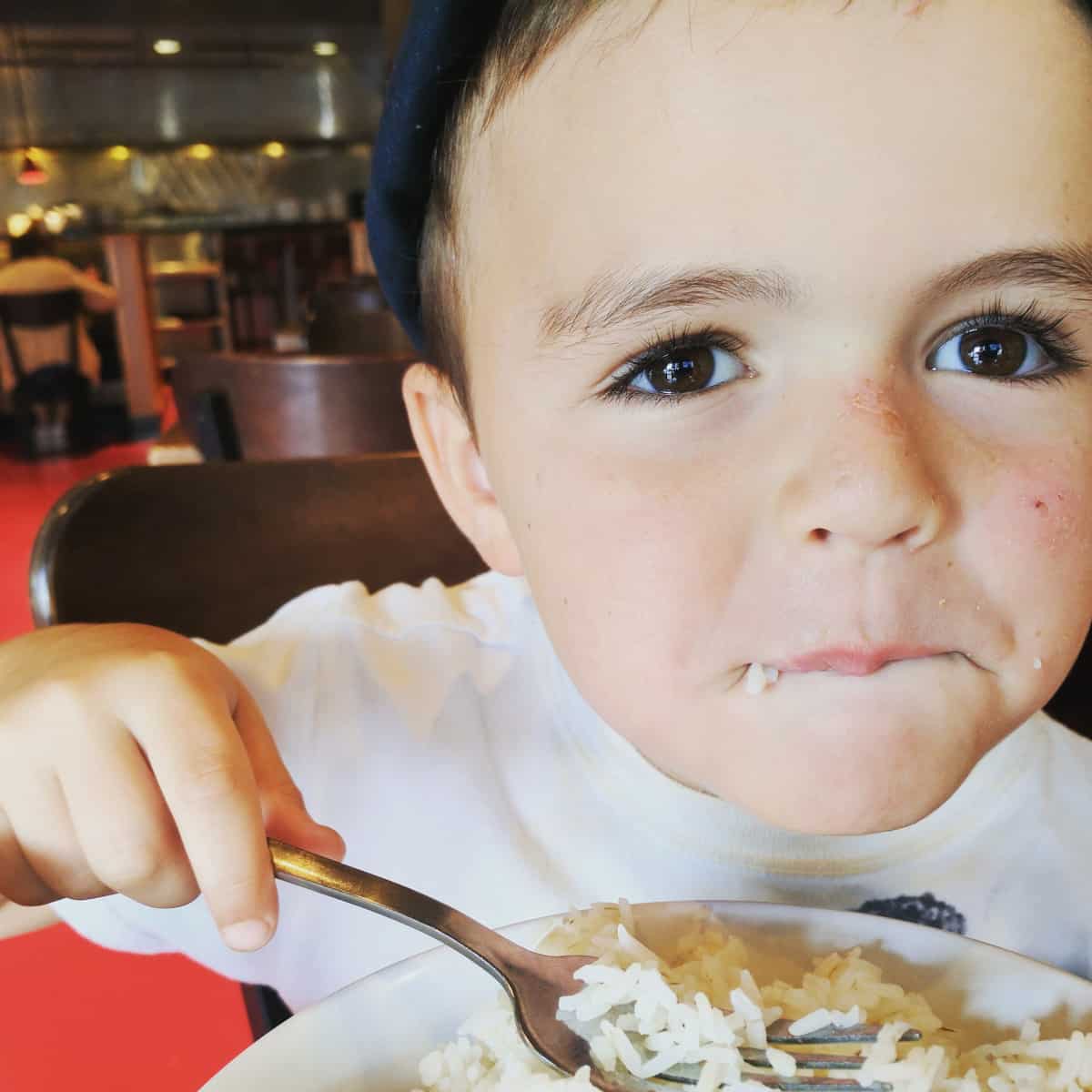 Boy Eating Rice