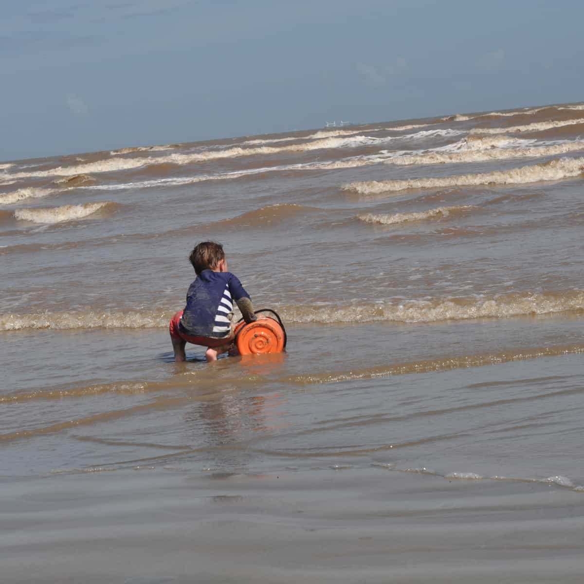 East Beach Galveston Island Playing in Water