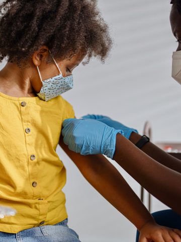 Memorial Hermann Nurse Giving a Bandaid