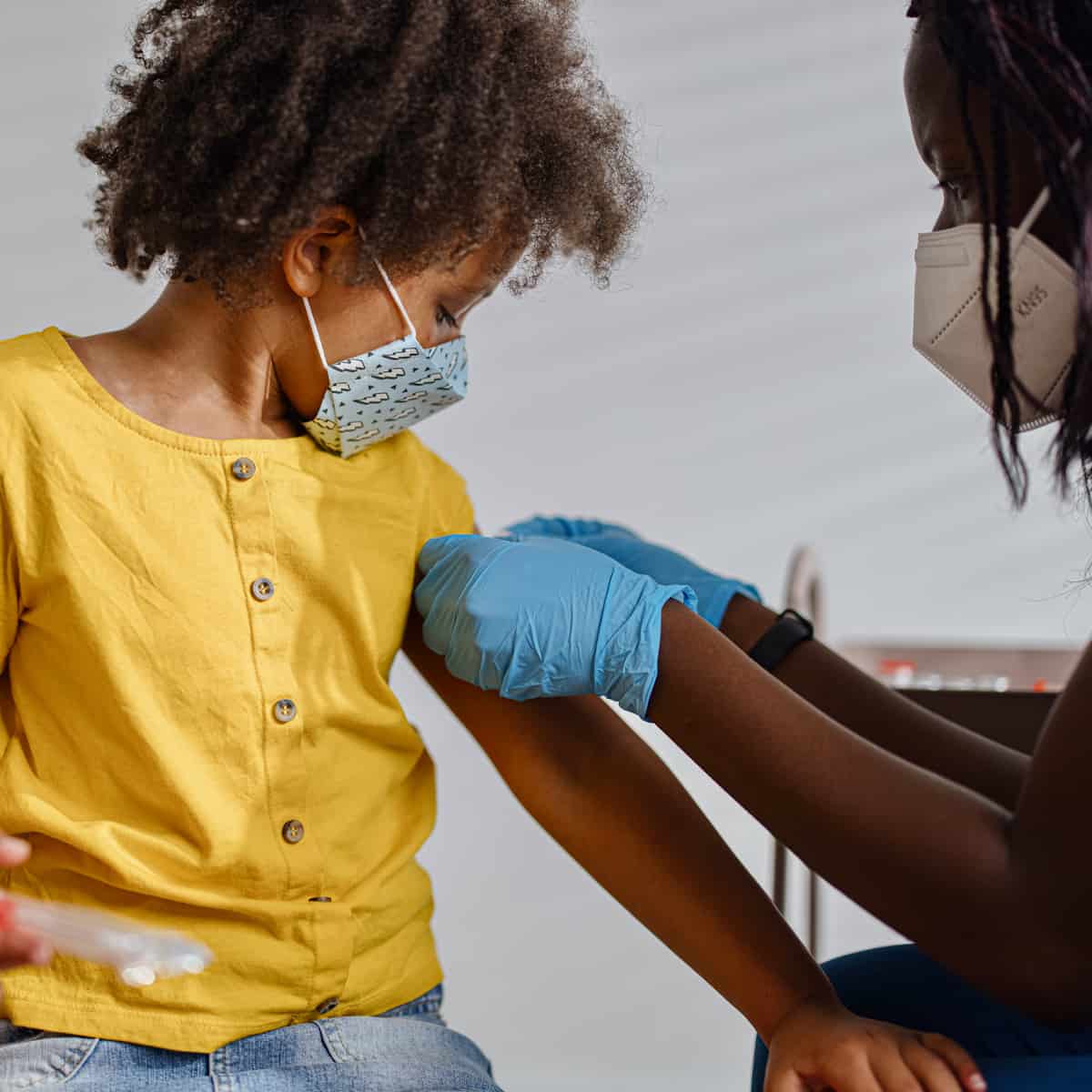 Memorial Hermann Nurse Giving a Bandaid