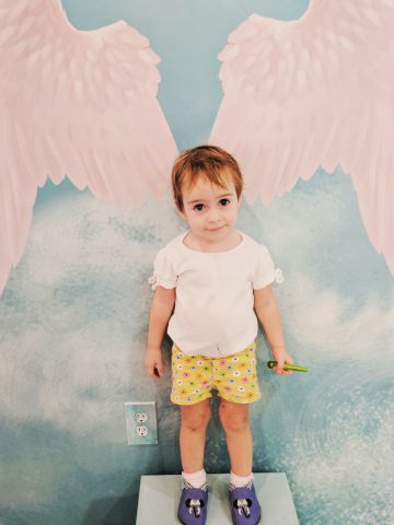 Baby angel at ice cream shop