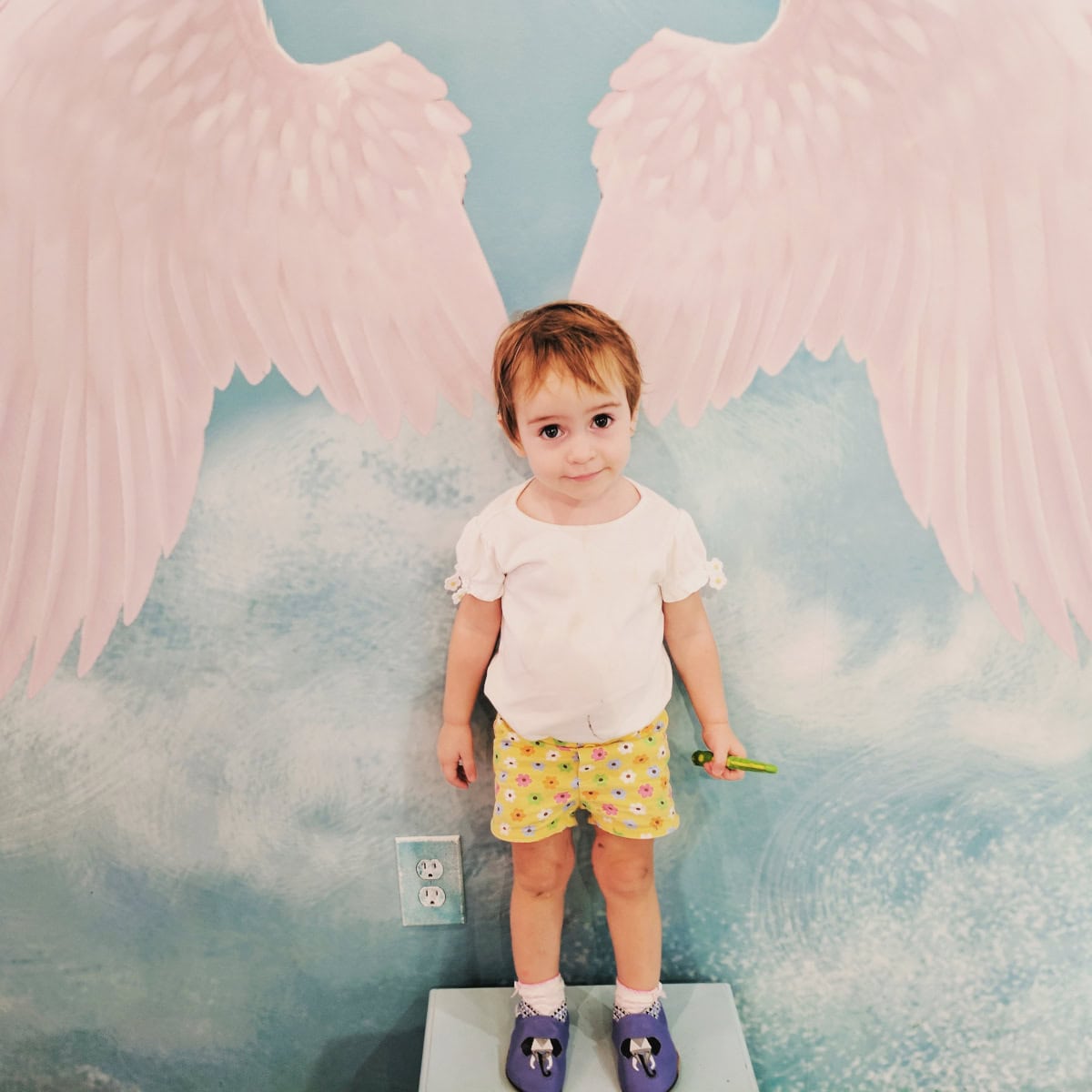 Baby angel at ice cream shop