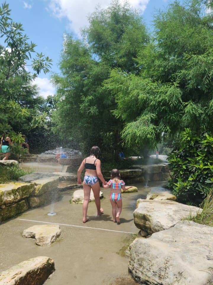 Hermann Park The Commons Splashpad Kids Walking in Water
